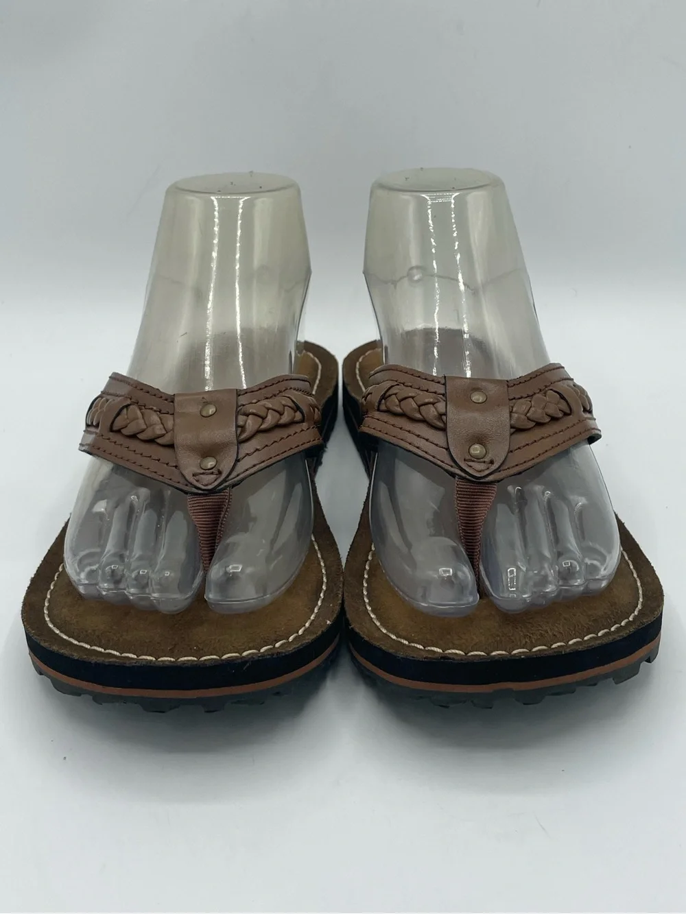 Clarks Collection Women’s Brown Braided Leather Toe-Post Sandals.